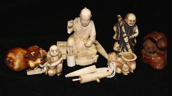 Four Japanese ivory netsuke and a vegetable ivory snuff bottle